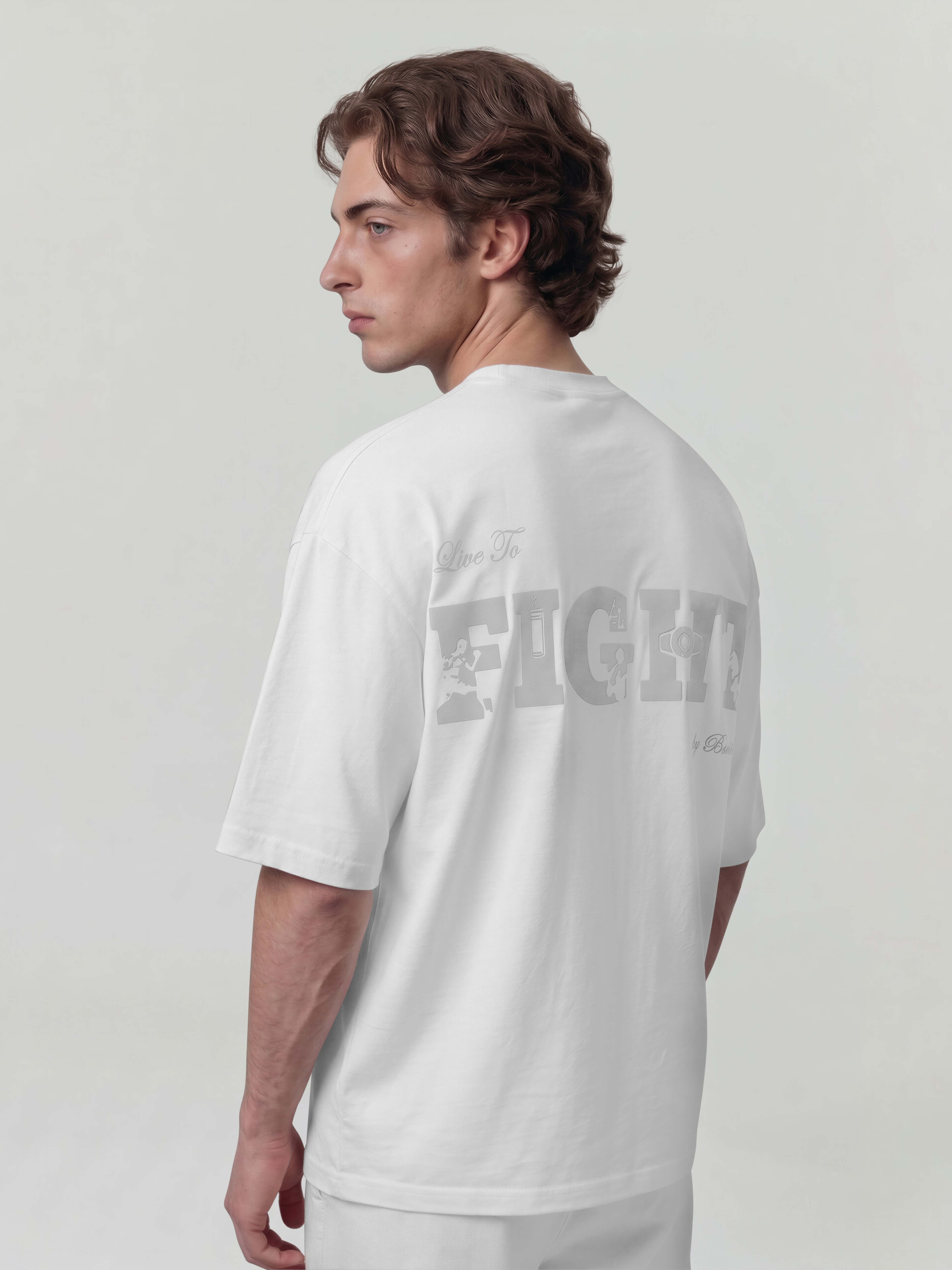White oversized Bshido t-shirt back angled view featuring “Live To Fight” graphic print