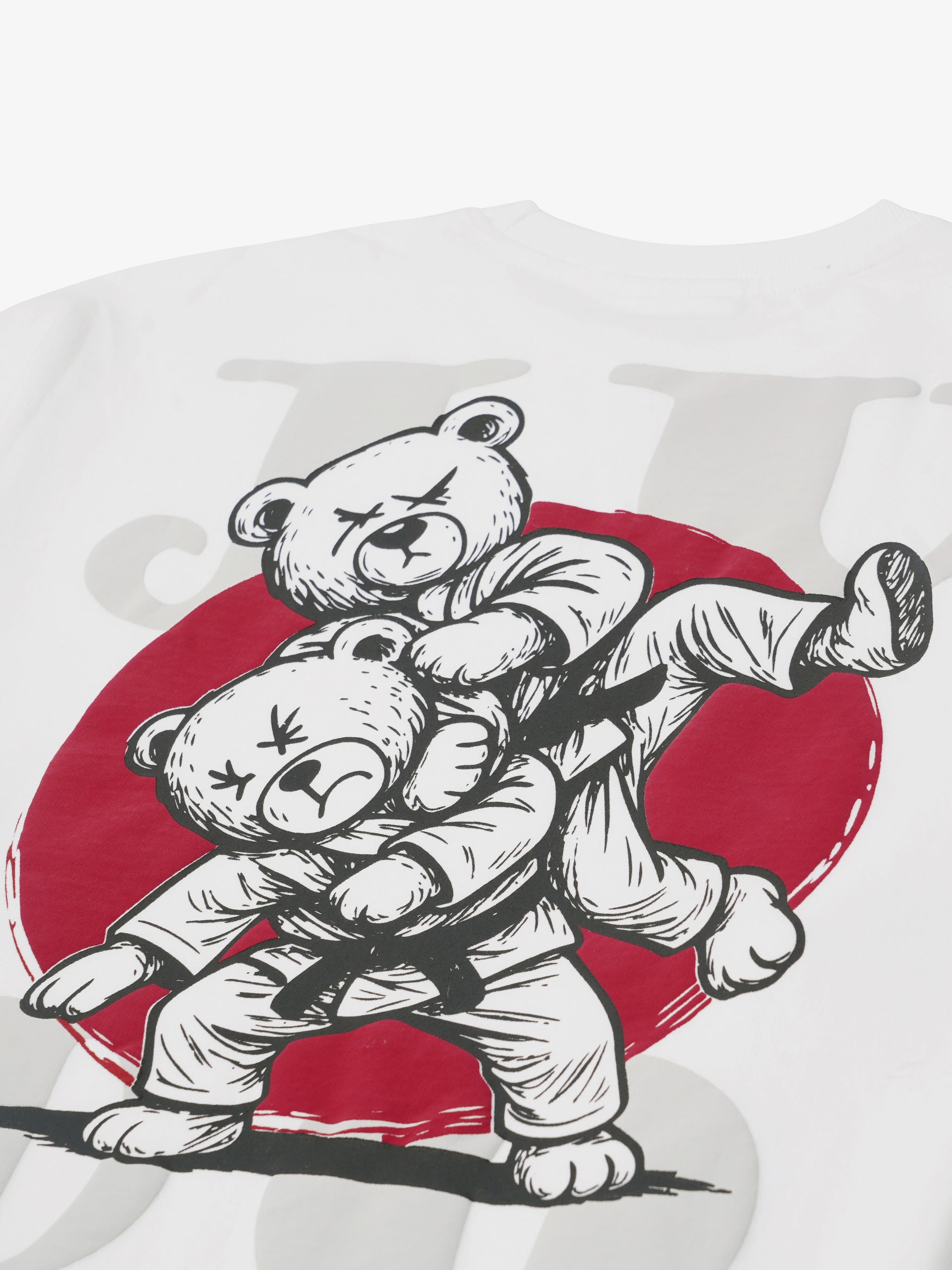 white t-shirt back print close up showing judo bear graphic