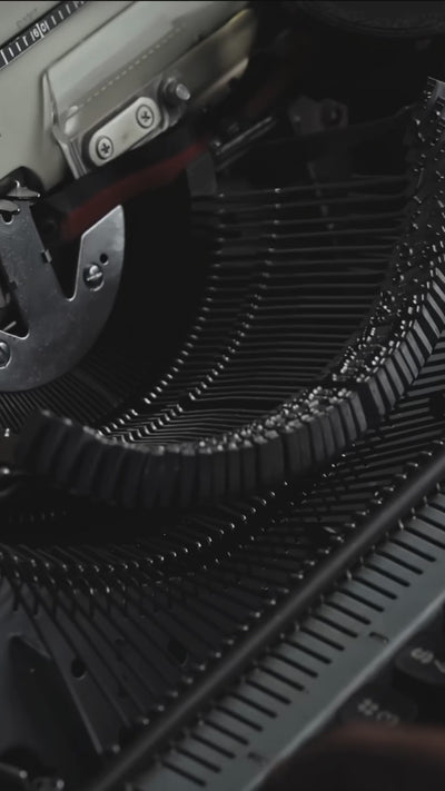 Cinematic macro video of a vintage typewriter typing the words "Prologue by Bshido" on paper